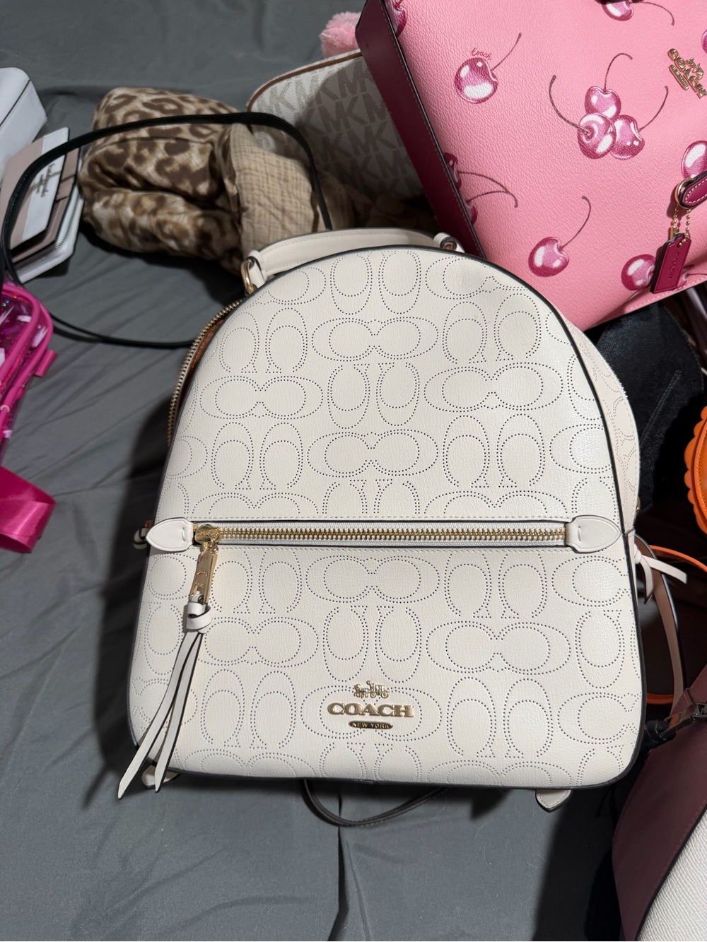 COACH Cream Perforated Signature Leather Backpack
